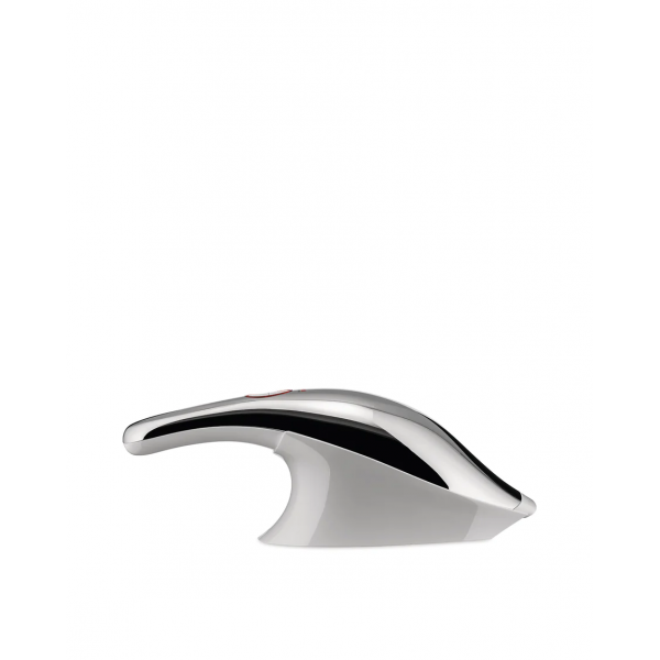 Alessi Handheld vacuum cleaner, rechargeable in 18/10 stainless steel mirror polished and thermoplastic resin, white. Charger in thermoplastic resin with integrated crevice tool and wet nozzle. US plug.
