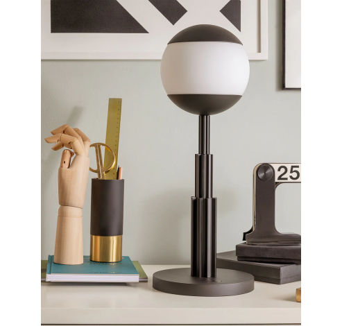 Table lamp in coloured aluminium, black and glass sphere. Rechargeable battery and touch dimmer. 5W 5V LED light. Adapter with interchangeable plugs.  Alessi
