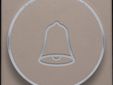 Afwerkingsset met doorschijnende ring met belsymbool voor drukknop 6 A met amberkleurige led met E10-lampvoet, greige