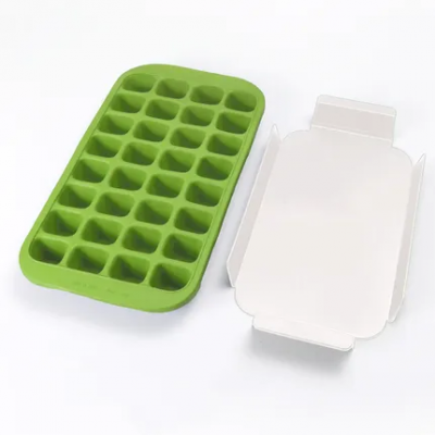 Ijsblokjesvorm uit rubber met dienblad voor 32 ijsblokken groen 33.5x18x3.3cm  Lékué